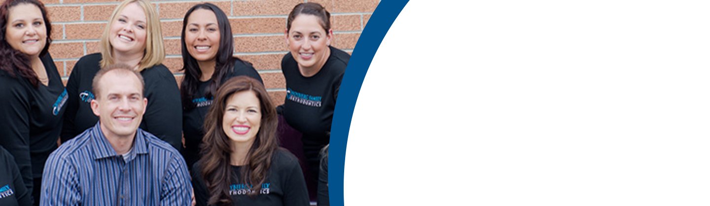 Dr. Christian Hoybjerg smiling for a group photo with the staff at Hoybjerg Family Orthodontics.